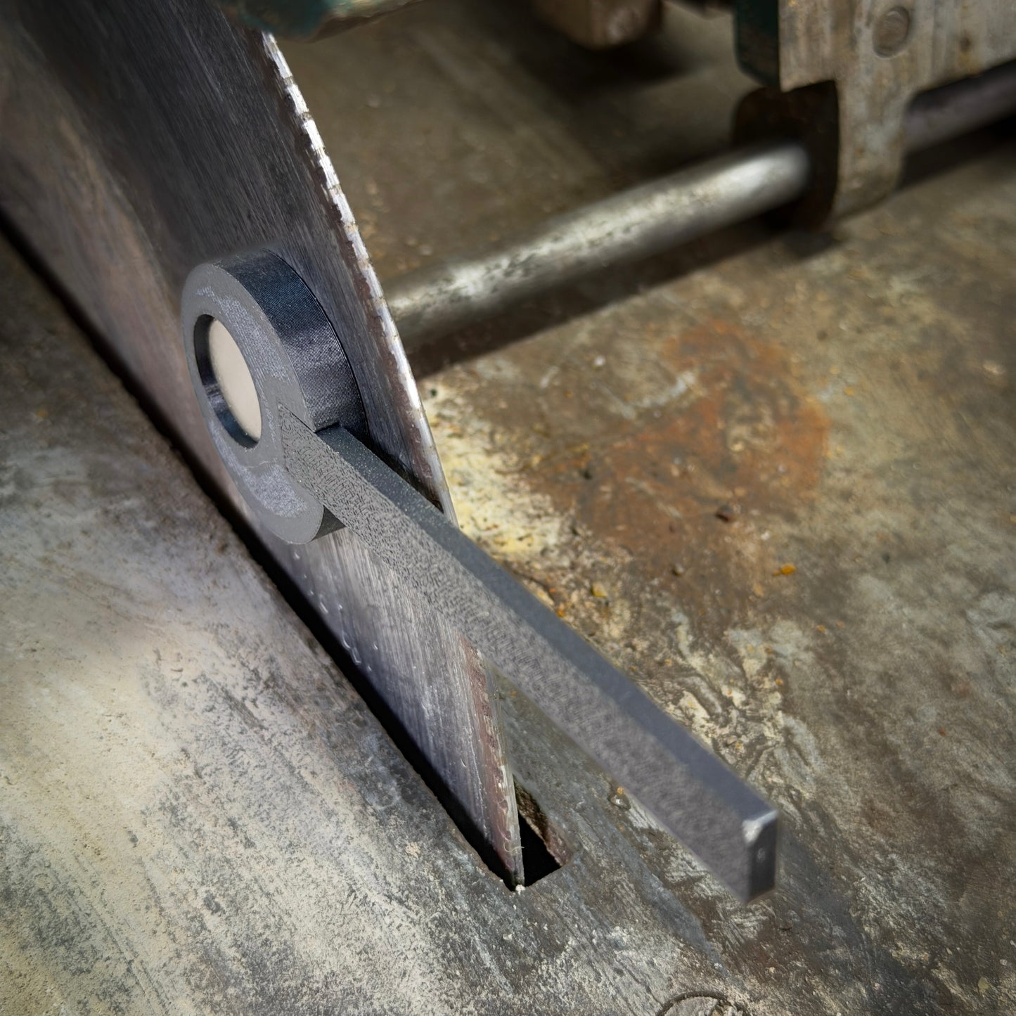 black plastic tool on saw blade