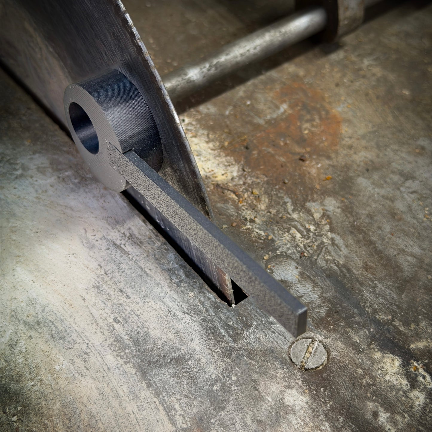 black plastic tool on saw blade